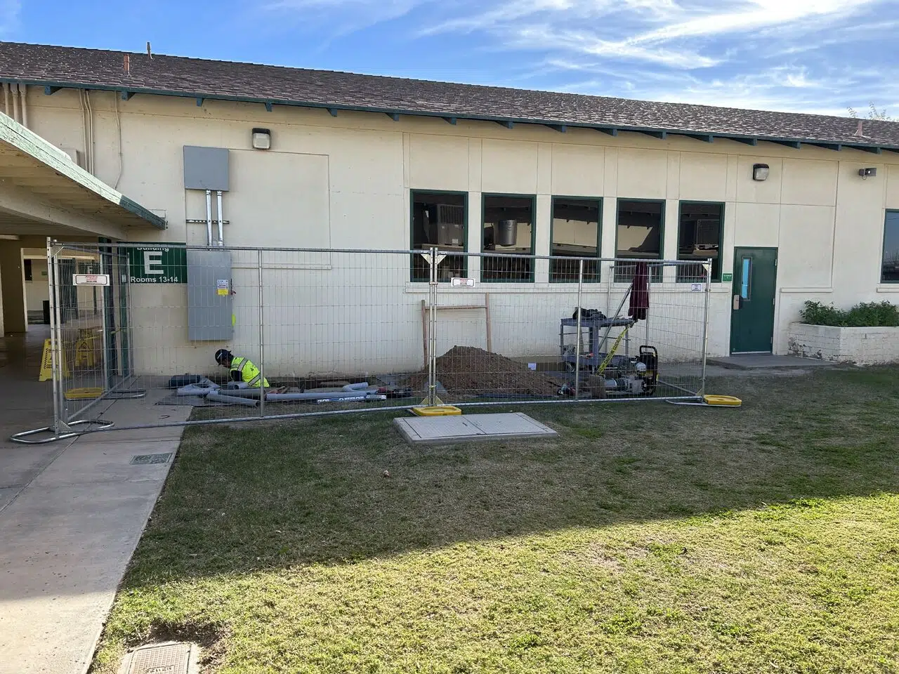 Westmoreland fence install safely securing construction material.